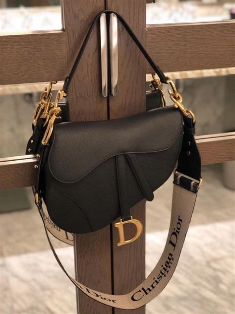 dior strap saddle|Dior saddle bag on model.